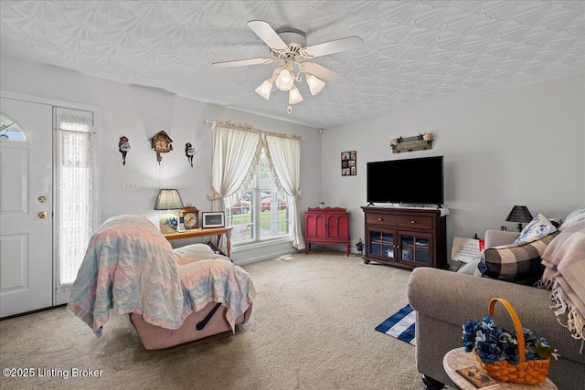 103 Holly Hills Dr, Fairdale, KY 40118 - living area with carpet and ceiling fan