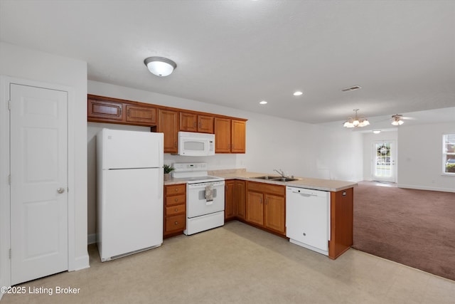 7230 Michael Benjamin Cir, Crestwood, KY 40014 - kitchen featuring white appliances, light colored carpet, light countertops, a peninsula, and open floor plan