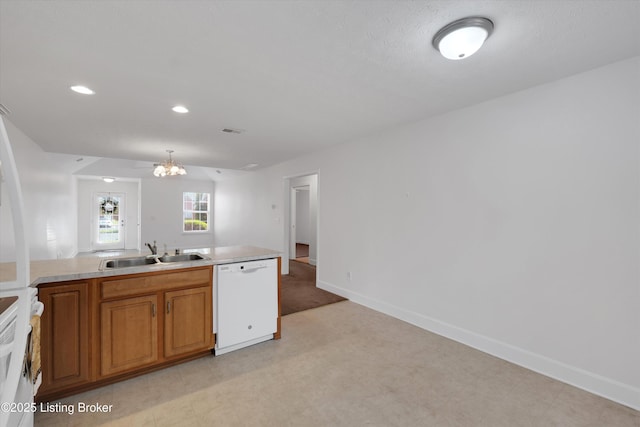 7230 Michael Benjamin Cir, Crestwood, KY 40014 - kitchen featuring dishwasher, range, a chandelier, brown cabinets, and light countertops