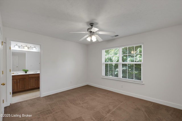 7230 Michael Benjamin Cir, Crestwood, KY 40014 - unfurnished bedroom featuring light carpet, ensuite bathroom, and a ceiling fan