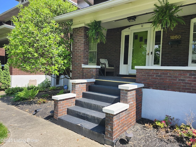1860 Alfresco Pl, Louisville, KY 40205 - property entrance with covered porch and brick siding