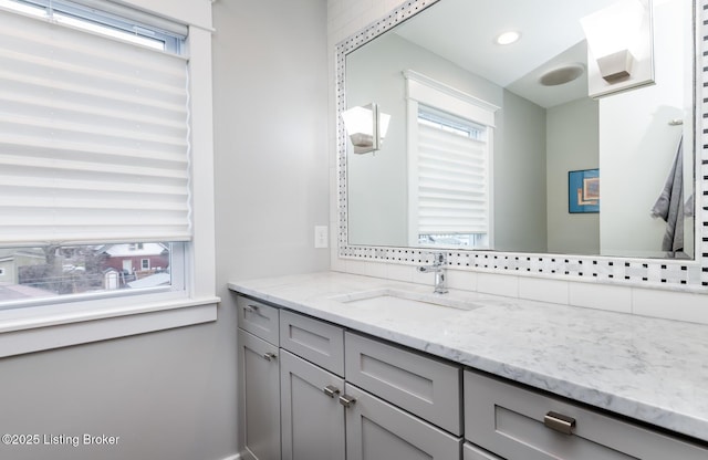 1860 Alfresco Pl, Louisville, KY 40205 - bathroom featuring plenty of natural light, vanity, recessed lighting, and decorative backsplash