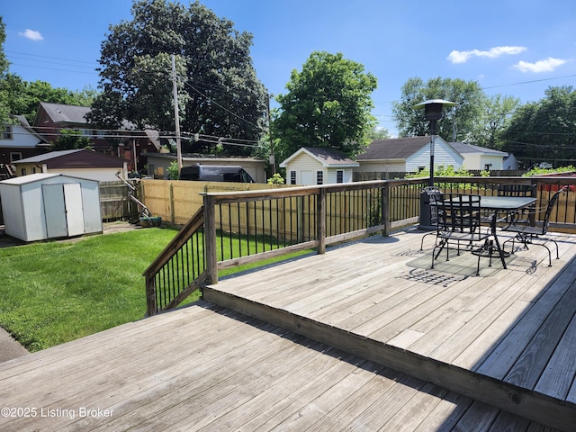 1860 Alfresco Pl, Louisville, KY 40205 - deck with a storage unit, a fenced backyard, and outdoor dining area