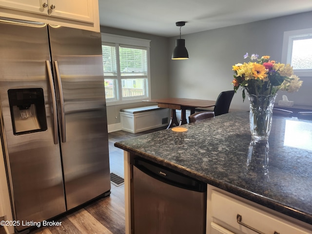 1860 Alfresco Pl, Louisville, KY 40205 - kitchen with appliances with stainless steel finishes, dark wood finished floors, white cabinets, and hanging light fixtures