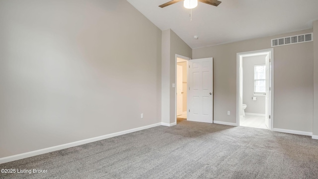 4806 Middlesex Dr, Louisville, KY 40245 - unfurnished bedroom featuring vaulted ceiling, carpet flooring, connected bathroom, and ceiling fan
