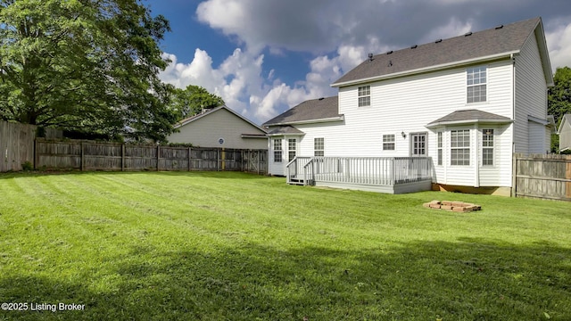 4806 Middlesex Dr, Louisville, KY 40245 - back of house with a fenced backyard, a shingled roof, and a wooden deck