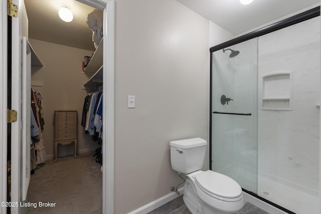 614 Armadale Pl, Douglass Hills, KY 40243 - bathroom featuring a stall shower and a walk in closet