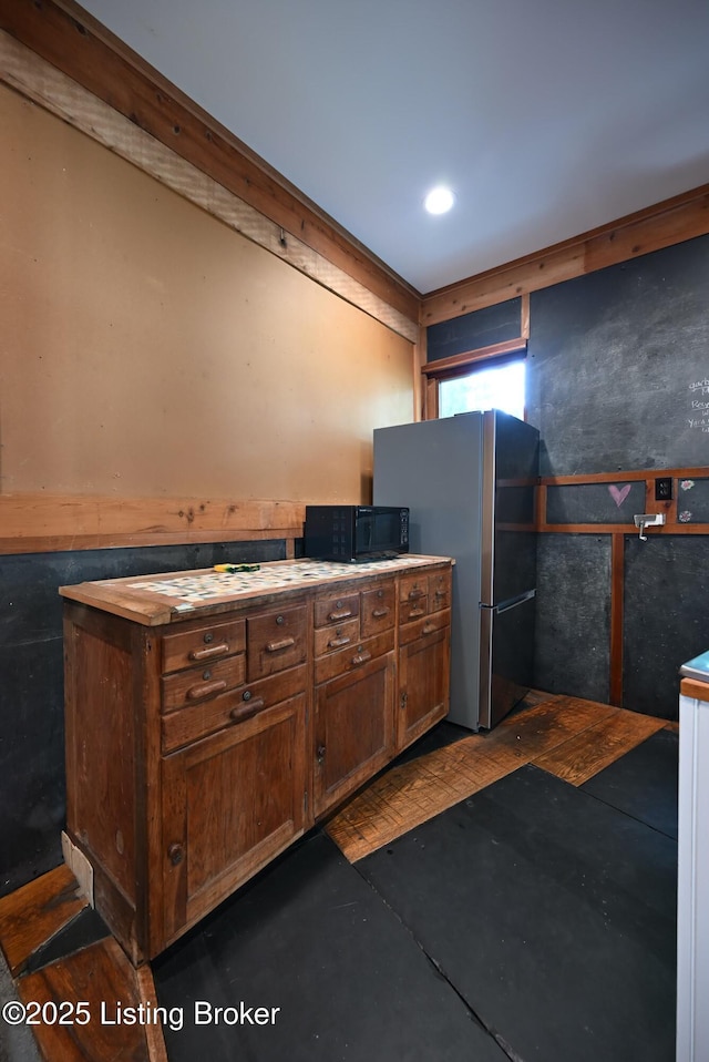 1819 Eastern Pkwy, Louisville, KY 40204 - kitchen featuring black microwave and freestanding refrigerator