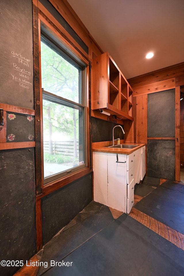 1819 Eastern Pkwy, Louisville, KY 40204 - kitchen featuring white cabinets, plenty of natural light, and open shelves