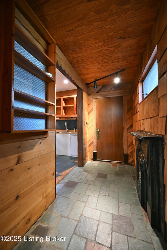 1819 Eastern Pkwy, Louisville, KY 40204 - corridor featuring wooden ceiling, stone tile floors, rail lighting, and wood walls