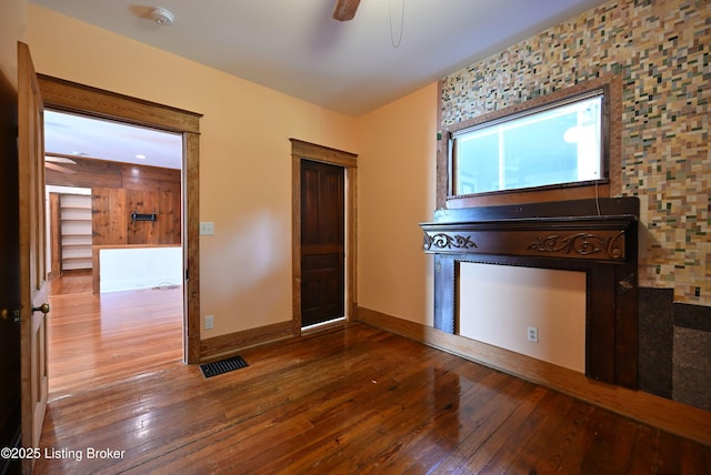 1819 Eastern Pkwy, Louisville, KY 40204 - unfurnished living room with ceiling fan and wood-type flooring
