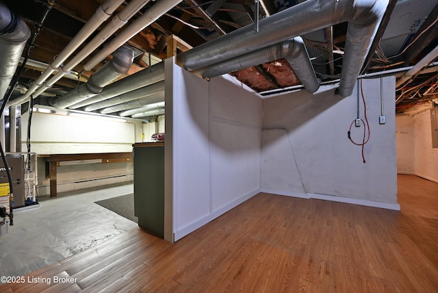 1819 Eastern Pkwy, Louisville, KY 40204 - unfinished basement featuring wood finished floors and electric panel