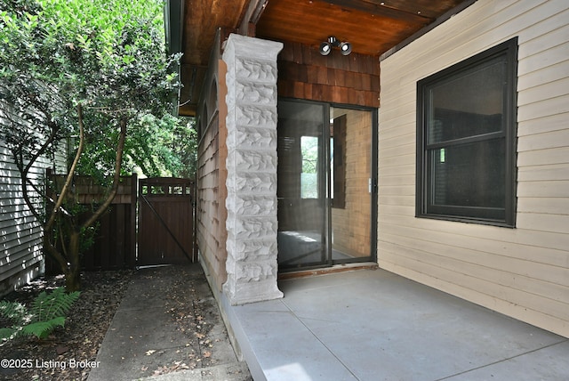 1819 Eastern Pkwy, Louisville, KY 40204 - view of exterior entry featuring a gate and a patio area