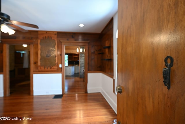 1819 Eastern Pkwy, Louisville, KY 40204 - interior space featuring wood walls, a ceiling fan, and wood finished floors