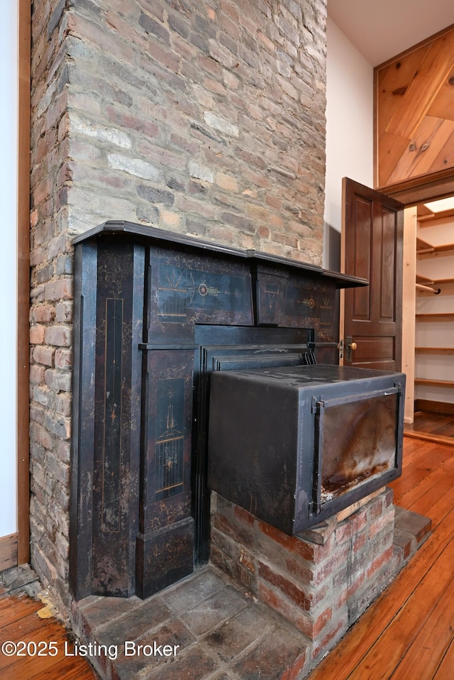 1819 Eastern Pkwy, Louisville, KY 40204 - detailed view of a fireplace and wood finished floors