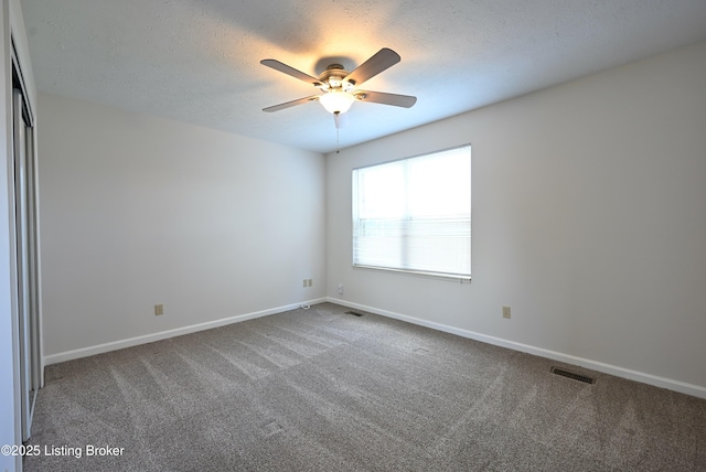 8705 Clover Ct, Louisville, KY 40242 - empty room featuring carpet flooring, ceiling fan, and a textured ceiling