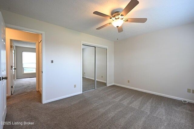 8705 Clover Ct, Louisville, KY 40242 - unfurnished bedroom featuring carpet floors, a closet, and a ceiling fan