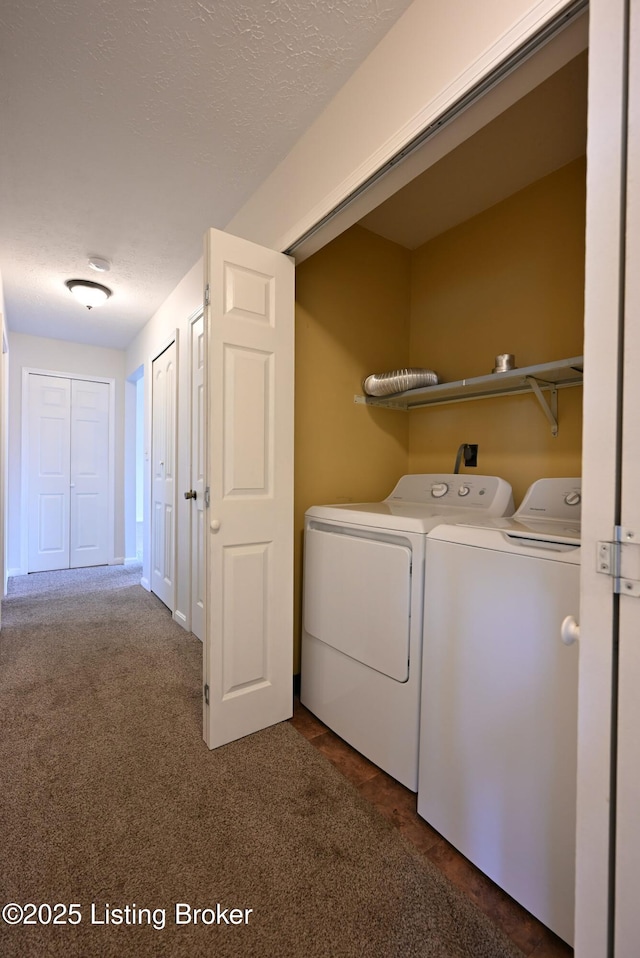 8705 Clover Ct, Louisville, KY 40242 - laundry area featuring separate washer and dryer, a textured ceiling, and dark colored carpet