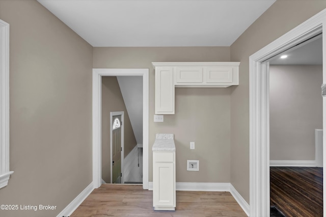 2620 Algonquin Pkwy, Louisville, KY 40210 - washroom featuring light wood-type flooring and baseboards