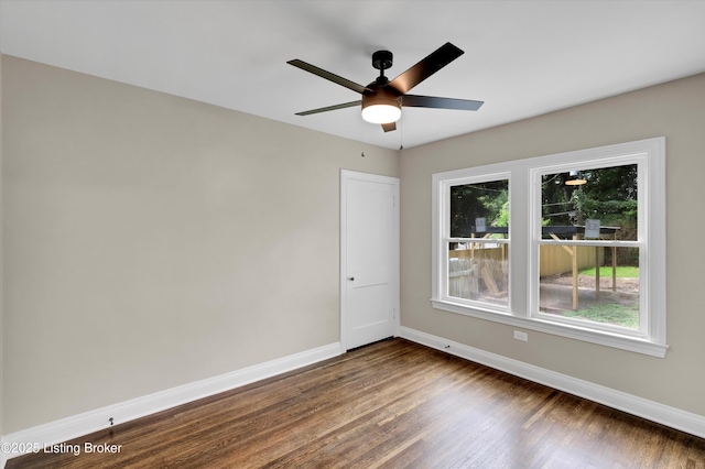 2620 Algonquin Pkwy, Louisville, KY 40210 - empty room featuring dark wood-style flooring and a ceiling fan