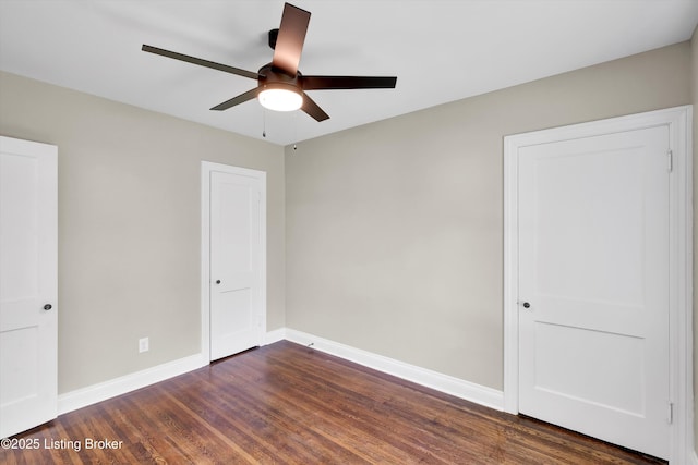 2620 Algonquin Pkwy, Louisville, KY 40210 - unfurnished bedroom featuring dark wood-style flooring and ceiling fan