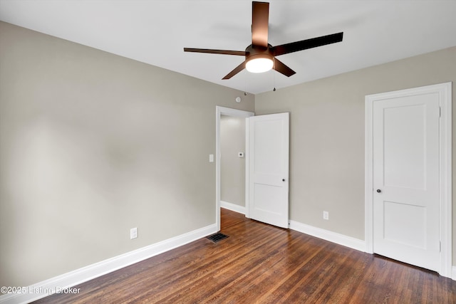 2620 Algonquin Pkwy, Louisville, KY 40210 - unfurnished bedroom featuring dark wood-style floors and ceiling fan
