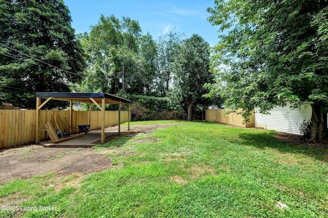 2620 Algonquin Pkwy, Louisville, KY 40210 - fenced backyard featuring a detached carport