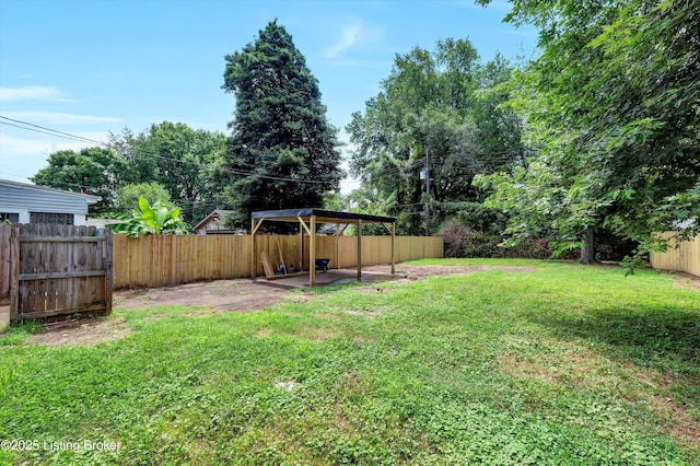 2620 Algonquin Pkwy, Louisville, KY 40210 - fenced backyard with a patio area
