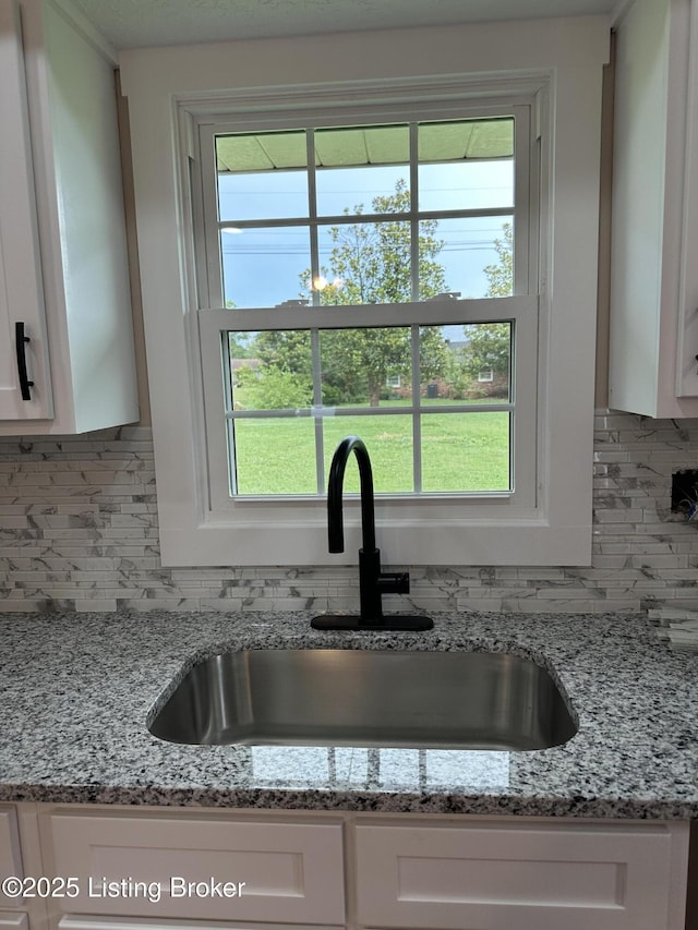 106 Sunflower Dr, Campbellsville, KY 42718 - kitchen view of white cabinetry and backsplash