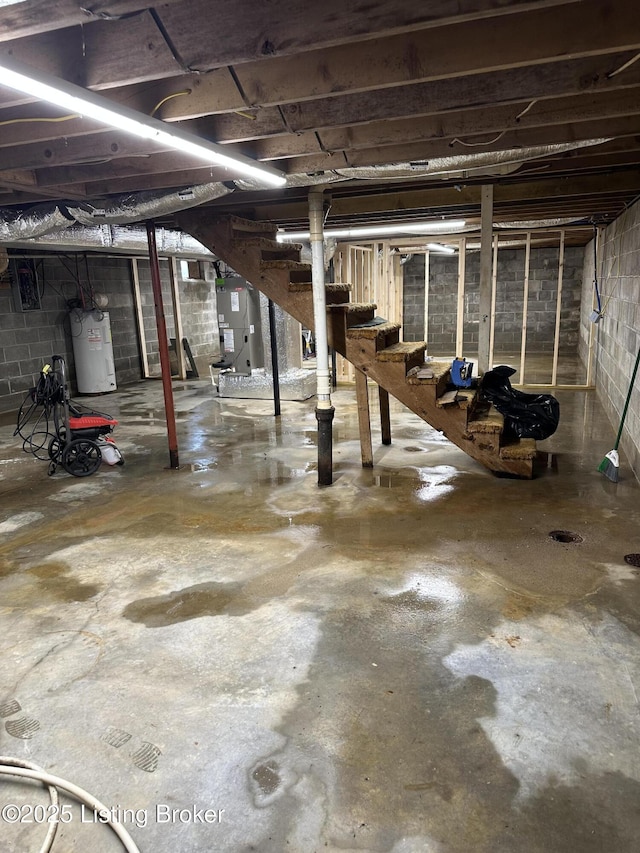 106 Sunflower Dr, Campbellsville, KY 42718 - unfinished below grade area featuring electric water heater and stairway