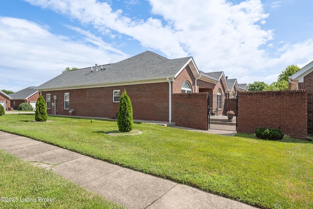 3105 Arbor Ridge Ln, New Albany, IN 47150 - view of property exterior featuring a gate, brick siding, and a shingled roof
