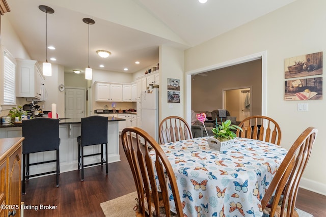 3105 Arbor Ridge Ln, New Albany, IN 47150 - dining room featuring dark wood-style floors, lofted ceiling, and recessed lighting