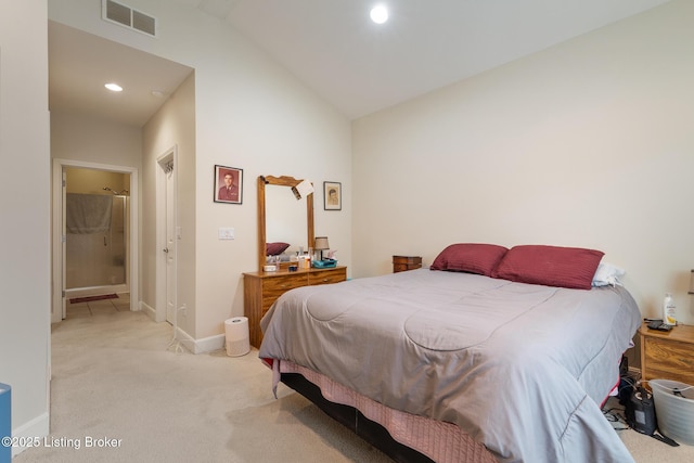 3105 Arbor Ridge Ln, New Albany, IN 47150 - bedroom featuring light colored carpet, vaulted ceiling, recessed lighting, and ensuite bath