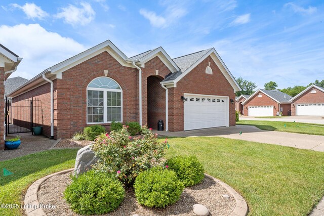 3105 Arbor Ridge Ln, New Albany, IN 47150 - view of front of home with brick siding, a front lawn, and a garage