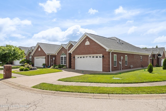 3105 Arbor Ridge Ln, New Albany, IN 47150 - view of front facade with brick siding, an attached garage, a front yard, and driveway