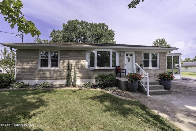 10703 Cedar Creek Rd, Louisville, KY 40229 - ranch-style house with stone siding and a front lawn