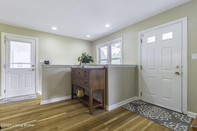 10703 Cedar Creek Rd, Louisville, KY 40229 - foyer entrance featuring wood finished floors and recessed lighting