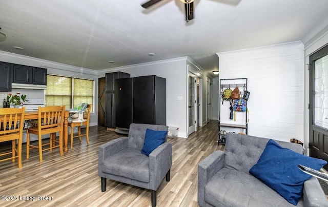 551 Tindale Dr, Taylorsville, KY 40071 - living room featuring ornamental molding, light wood-type flooring, and ceiling fan