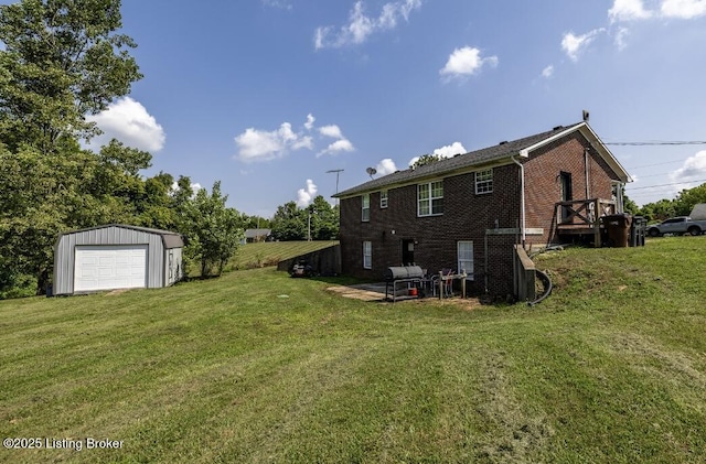 551 Tindale Dr, Taylorsville, KY 40071 - rear view of property with an outbuilding, brick siding, a lawn, and a garage