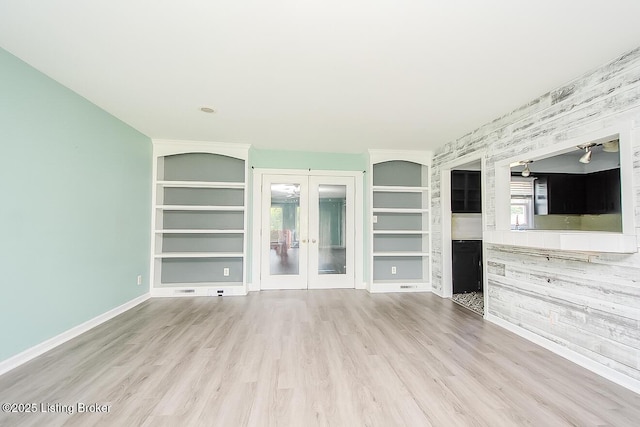 315 Tophill Dr, Shelbyville, KY 40065 - unfurnished living room with french doors, built in shelves, and wood finished floors