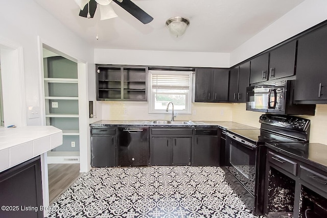 315 Tophill Dr, Shelbyville, KY 40065 - kitchen featuring black appliances, ceiling fan, dark cabinets, decorative backsplash, and light wood-style floors