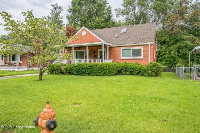 4418 Mann Ave, Louisville, KY 40215 - view of front facade with brick siding, roof with shingles, and covered porch