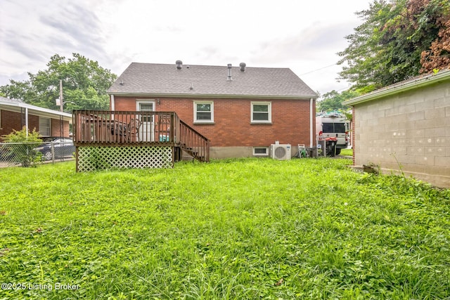 4418 Mann Ave, Louisville, KY 40215 - rear view of property featuring brick siding, a deck, and roof with shingles