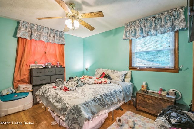 4418 Mann Ave, Louisville, KY 40215 - bedroom with wood finished floors and ceiling fan
