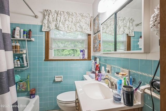 4418 Mann Ave, Louisville, KY 40215 - full bath with tile walls and vanity
