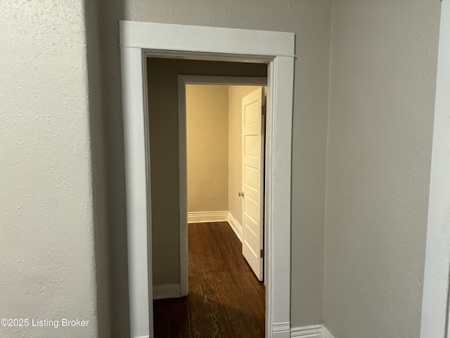 1851 Date St, Louisville, KY 40210 - hall with dark wood-style flooring and baseboards