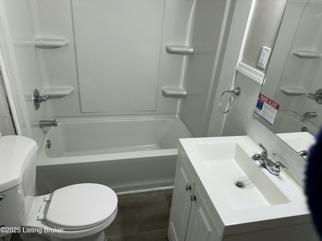 1851 Date St, Louisville, KY 40210 - bathroom with vanity, shower / bathtub combination, and wood finished floors