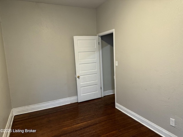 1851 Date St, Louisville, KY 40210 - spare room with dark wood-style floors and baseboards