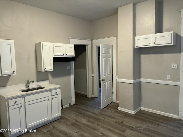 1851 Date St, Louisville, KY 40210 - kitchen with white cabinetry, dark wood-style floors, and light countertops