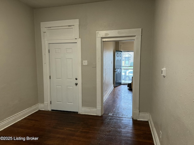 1851 Date St, Louisville, KY 40210 - foyer with hardwood / wood-style flooring and a textured wall